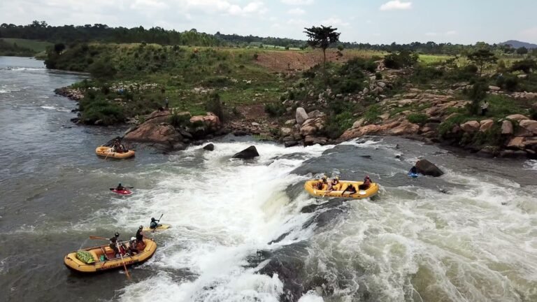 Rafts running whitewater on the Victoria Nile below Jinja, Uganda