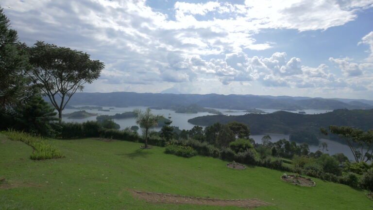 The terraced shoreline and islands of Lake Bunyonyi under cloud