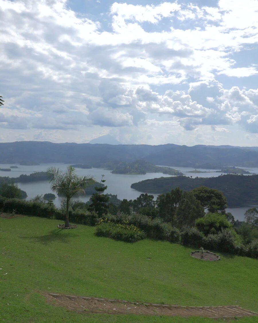 The terraced shoreline and islands of Lake Bunyonyi under cloud
