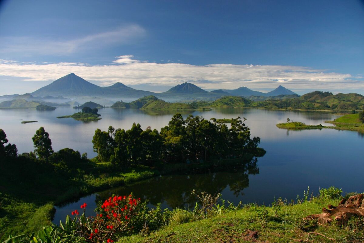 Lake Mutanda with the Virunga volcanoes rising behind it