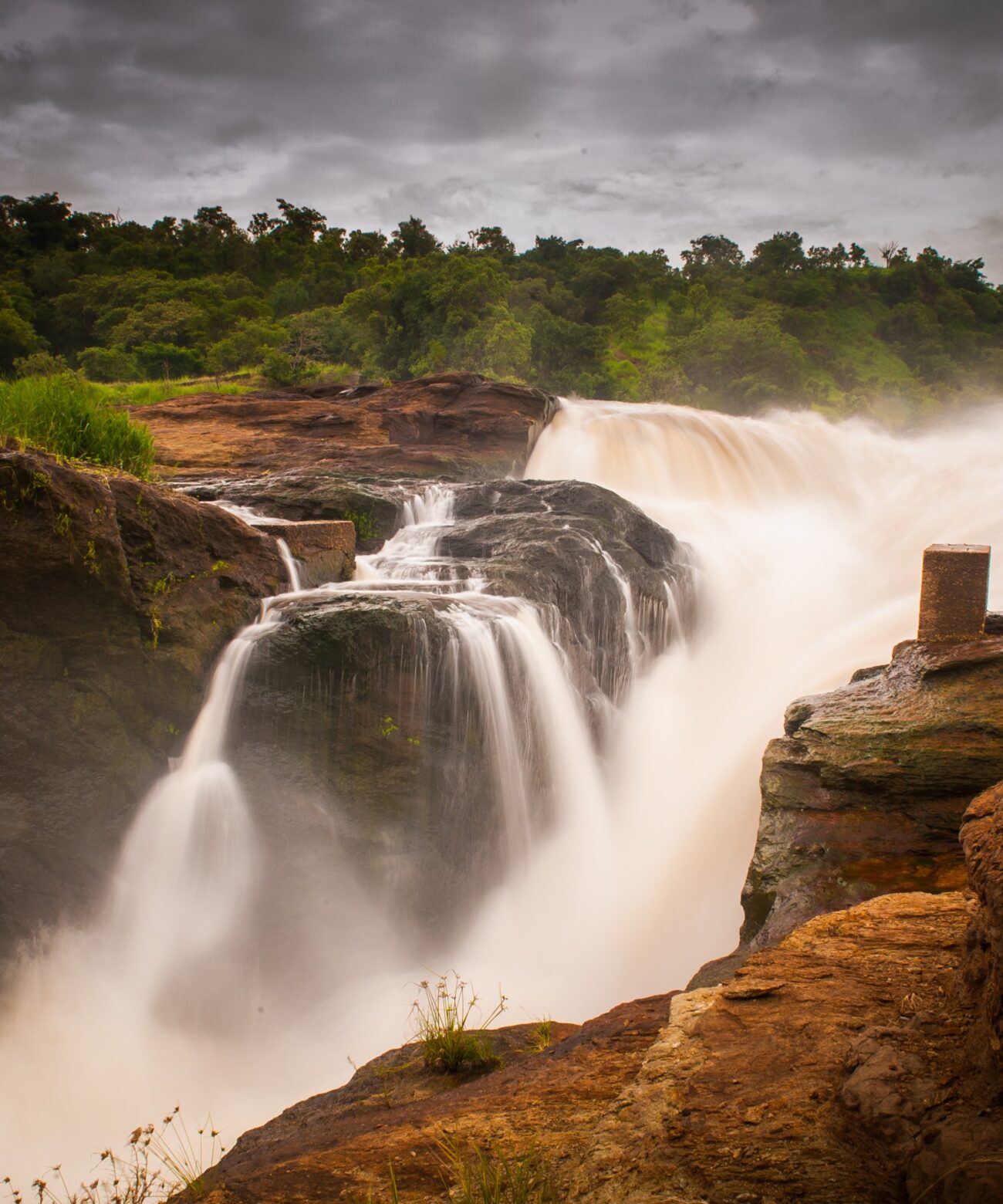 The Victoria Nile dropping through the gorge at Murchison Falls under a heavy sky, Uganda